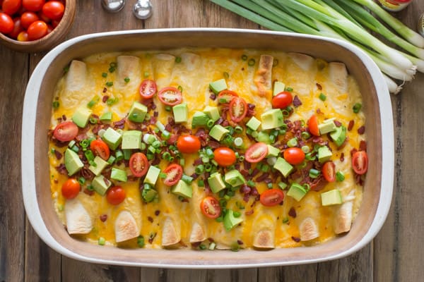 Top view of cheesy enchilada breakfast dish