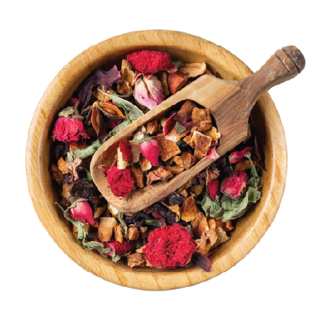 top view of a bowl of dried roses and herbs for tea