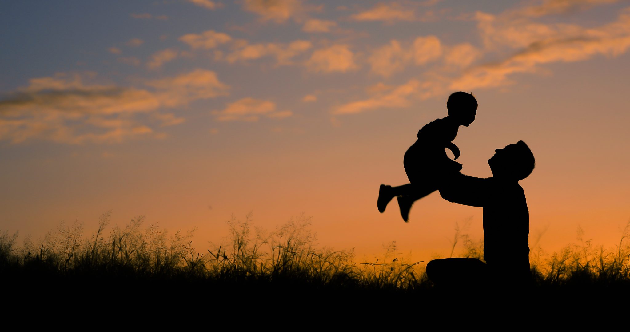 happy-father-playing-with-his-son-holding-him-up-in-the-air-father-son